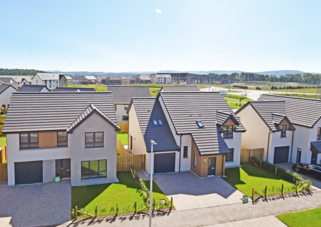 New homes with the Bertha Park High School in the background