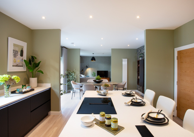Open plan kitchen dining area in Drummond Hill show home, Inverness